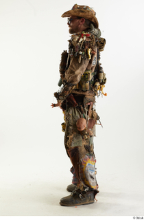  Ryan Miles in Junk Town Postapocalyptic Bobby Suit holding gun standing whole body 0003.jpg